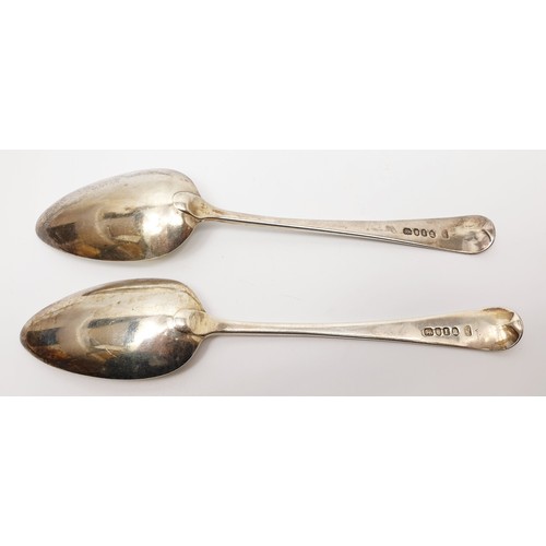 17 - A pair of Georgian hallmarked silver table spoons, weight 116g, London 1804. UK shipping £14.