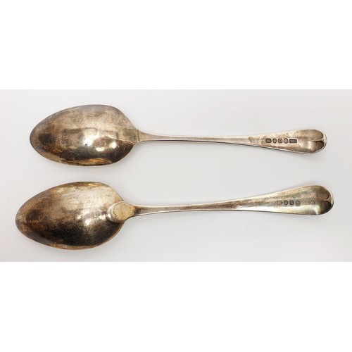 18 - Two Georgian silver hallmarked table spoons, 115g, London 1789 and 1791. UK shipping £14.