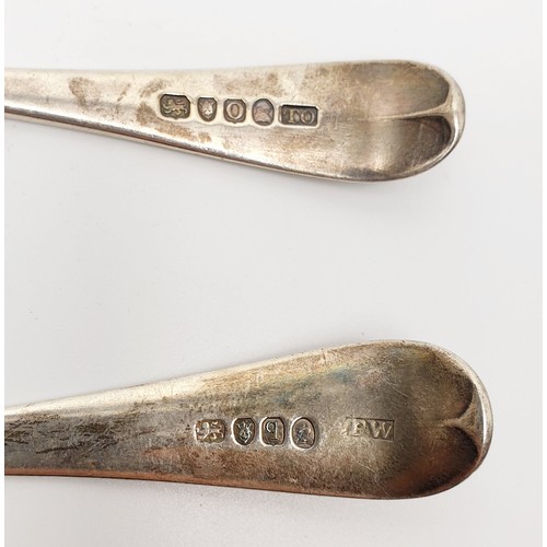 18 - Two Georgian silver hallmarked table spoons, 115g, London 1789 and 1791. UK shipping £14.