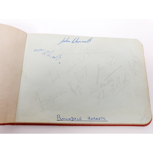 39 - An autograph album featuring signatures of late 50s and early 60s football teams including Leeds Uni... 