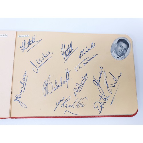 39 - An autograph album featuring signatures of late 50s and early 60s football teams including Leeds Uni... 