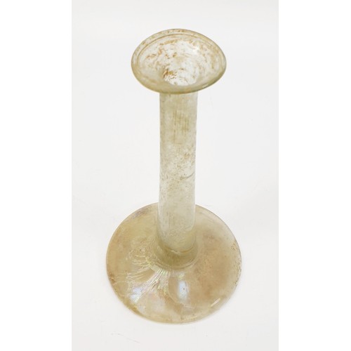 43 - Antiquities: a Roman glass unguentarium bottle, height 18.5cm. No shipping. Arrange collection or yo... 