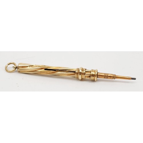 27 - A hallmarked 9ct gold propelling pencil, length extended 7cm, gross weight 4.2g. UK shipping £14.