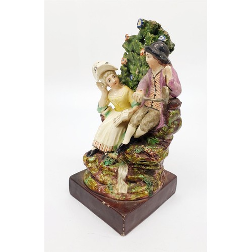 50 - A 19th century Staffordshire pearlware bocage figure 