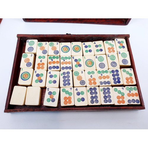 95 - A vintage bamboo and bone mah-jong set in a brass bound rosewood case, A/F. UK shipping £14.