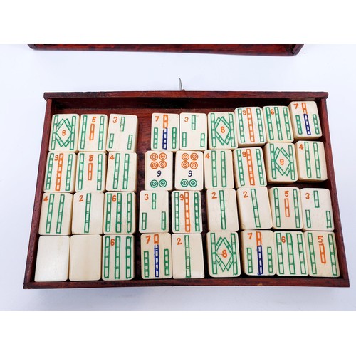 95 - A vintage bamboo and bone mah-jong set in a brass bound rosewood case, A/F. UK shipping £14.