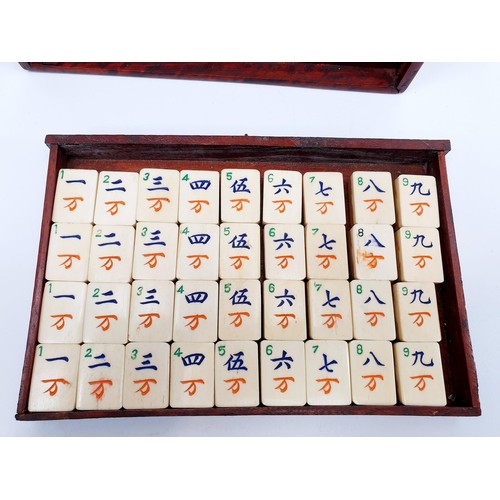 95 - A vintage bamboo and bone mah-jong set in a brass bound rosewood case, A/F. UK shipping £14.