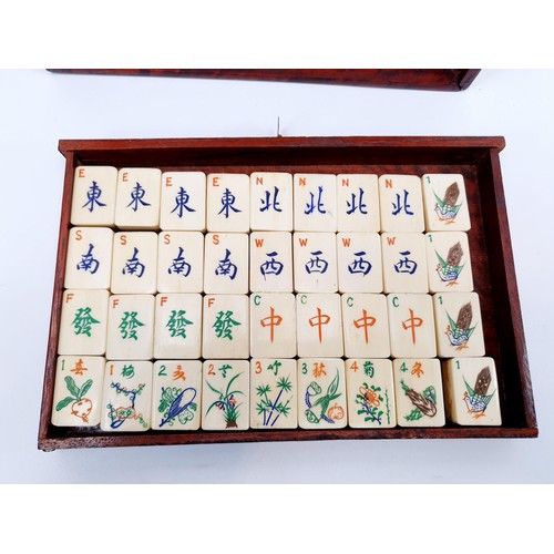 95 - A vintage bamboo and bone mah-jong set in a brass bound rosewood case, A/F. UK shipping £14.