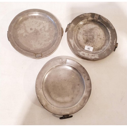 43 - Three antique pewter plate warmers, two having London stamps, diameter 24cm. UK shipping £14.