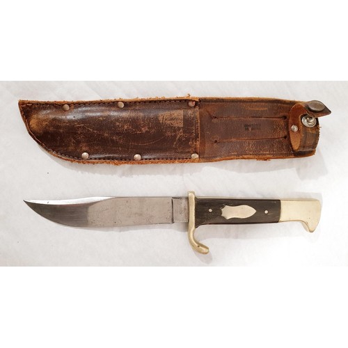 3 - A vintage Bushman's Friend bowie knife by William Rogers of Sheffield, overall length 23cm together ... 