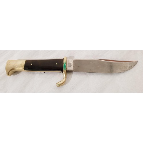 3 - A vintage Bushman's Friend bowie knife by William Rogers of Sheffield, overall length 23cm together ... 