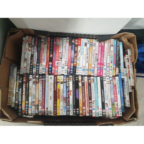 137 - Three boxes of DVDs. No shipping. Arrange collection or your own packer and shipper, please. Electri... 