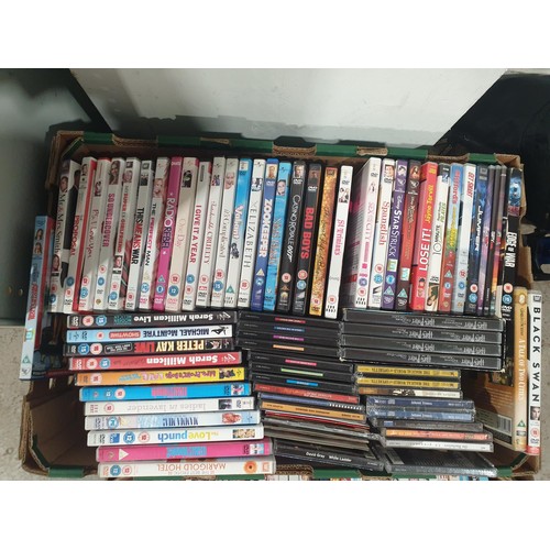 137 - Three boxes of DVDs. No shipping. Arrange collection or your own packer and shipper, please. Electri... 