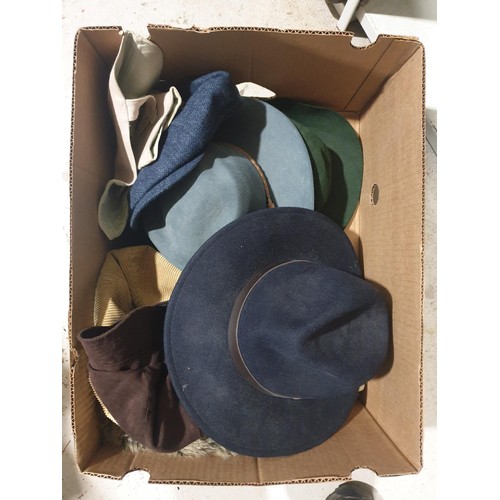 144 - A box of hats. UK shipping £14.