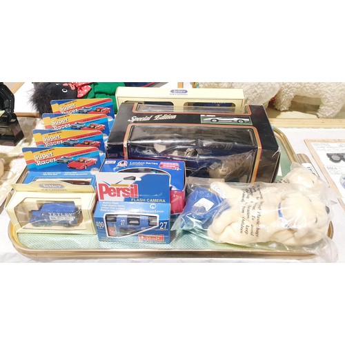 176 - A Maisto 1:18 scale model of a Jaguar XJ220 together with other toy vehicles and and advertising ite... 