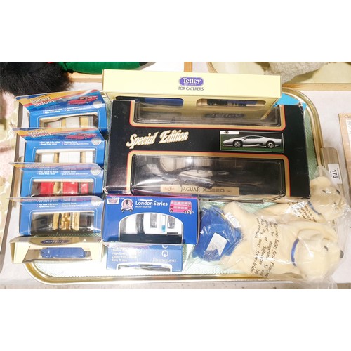 176 - A Maisto 1:18 scale model of a Jaguar XJ220 together with other toy vehicles and and advertising ite... 