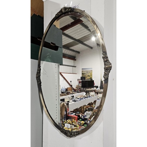 136 - A vintage bevelled wall mirror, length 83cm. No shipping. Arrange collection or your own packer and ... 