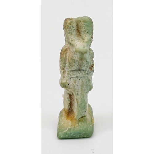 14 - An ancient Egyptian faience amulet in the form of the god Anubis, height 27mm. UK shipping £14.