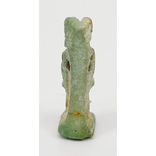 14 - An ancient Egyptian faience amulet in the form of the god Anubis, height 27mm. UK shipping £14.