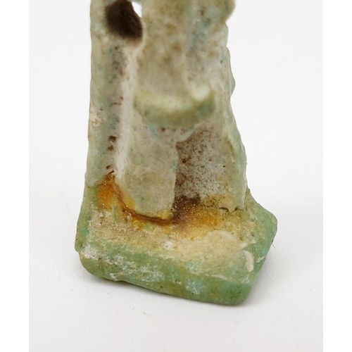 14 - An ancient Egyptian faience amulet in the form of the god Anubis, height 27mm. UK shipping £14.