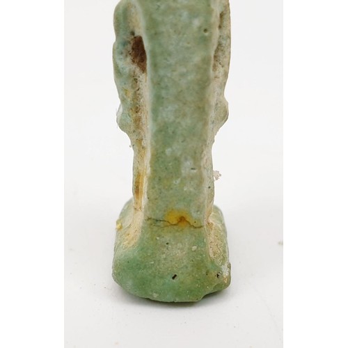 14 - An ancient Egyptian faience amulet in the form of the god Anubis, height 27mm. UK shipping £14.