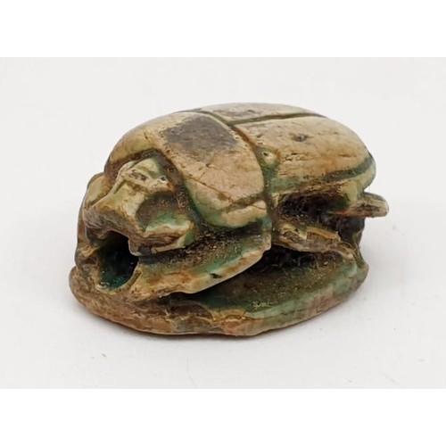 18 - An ancient Egyptian scarab seal, width 16mm. UK shipping £14.