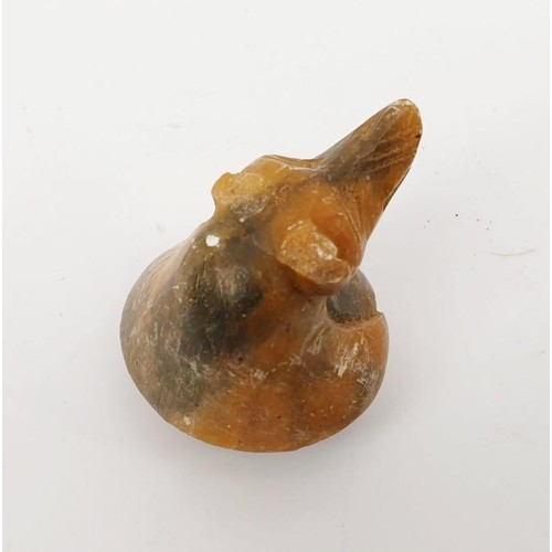 25 - An Egyptian style alabaster canopic jar lid in the form of Anubis, height 34mm. UK shipping £14.