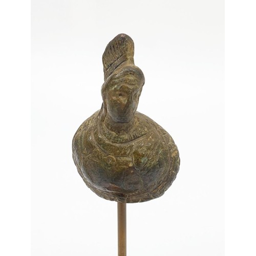 28 - An ancient cast bronze Roman applique on a later stand, height including stand 135mm. UK shipping £1... 