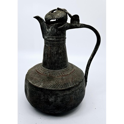 87 - Three antique Dallah coffee pots, the tallest 30cm. UK shipping £14.