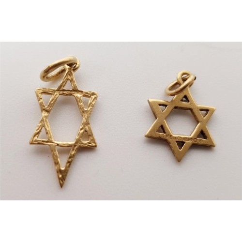 39 - Two hallmarked gold star pendants, weight 1.1g. UK shipping £14.