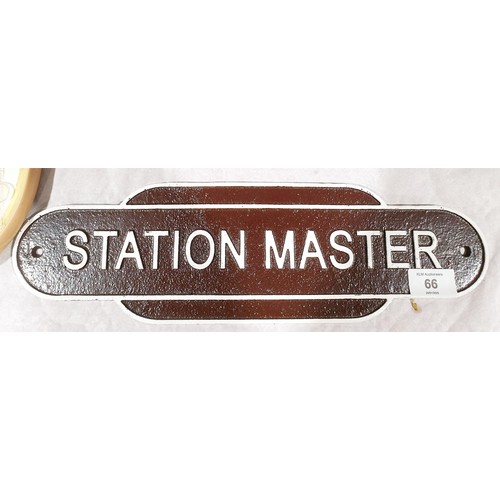 66 - A reproduction cast iron Station Master wall plaque, width 39cm. UK shipping £14.