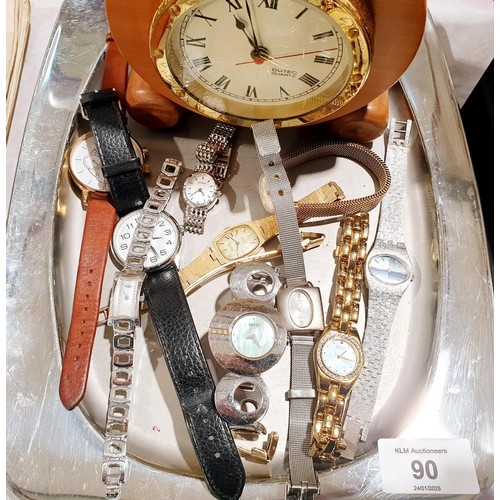 90 - Ladies wrist watches and a clock. UK shipping £14.