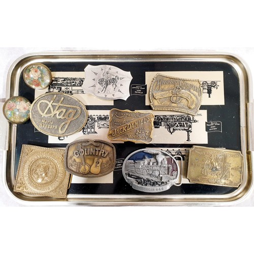 114 - A selection of belt buckles including Jack Daniels. UK shipping £14.