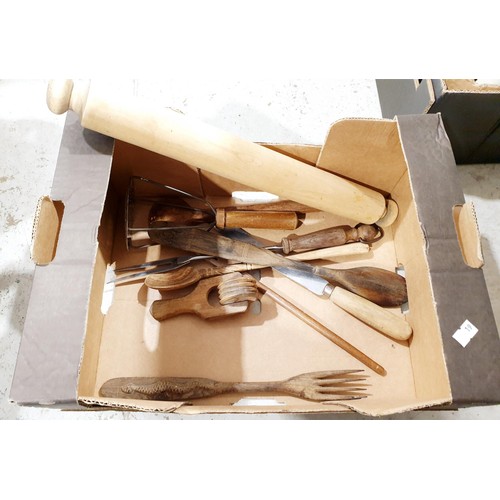 129 - A box of vintage kitchen utensils, a wooden chopping board and a French bread board. No shipping. Ar... 