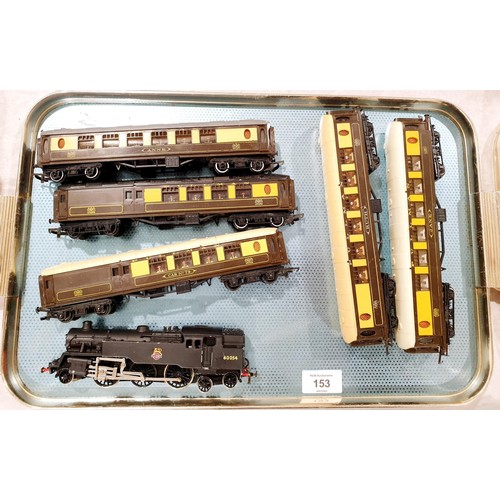 153 - A vintage Hornby 00 gauge locomotive and five Pullman carriages. UK shipping £14.