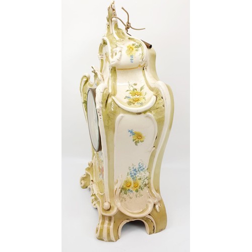 194 - A 19th century Royal Bonn ceramic mantel clock in the Rococo style, hand painted with flowers and ha... 