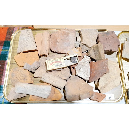 34 - A selection of ancient Roman terracotta fragments of roof tiles and other building materials. No shi... 