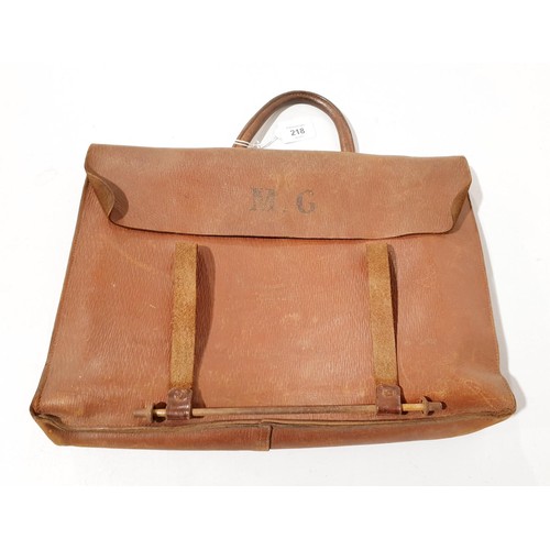 218 - A vintage leather satchel. UK shipping £14.