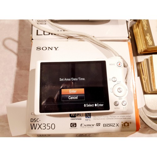 96 - A Sony Cyber Shot DCS-WX350 digital camera. UK shipping £14. Electricals are sold as scrap.