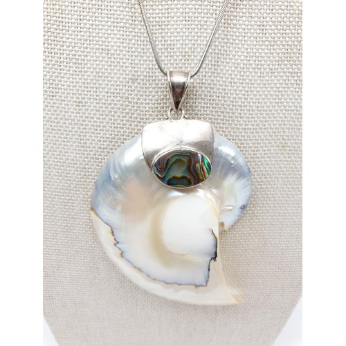 41D - A silver mounted nautilus shell pendant, length 8.5cm on a white metal chain, length 46cm. UK shippi... 