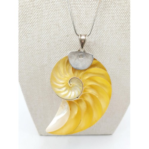 41D - A silver mounted nautilus shell pendant, length 8.5cm on a white metal chain, length 46cm. UK shippi... 