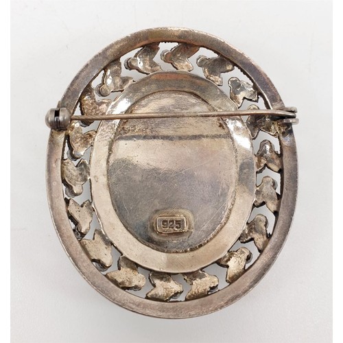 41E - A silver and marcasite brooch inset with a ceramic panel printed with a portrait of a lady, length 5... 