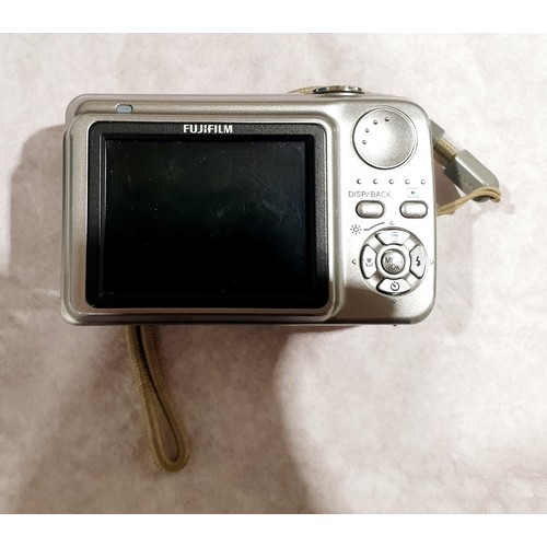 95 - A Fujifilm Finepix A 610 digital camera. UK shipping £14. Electricals are sold as scrap.