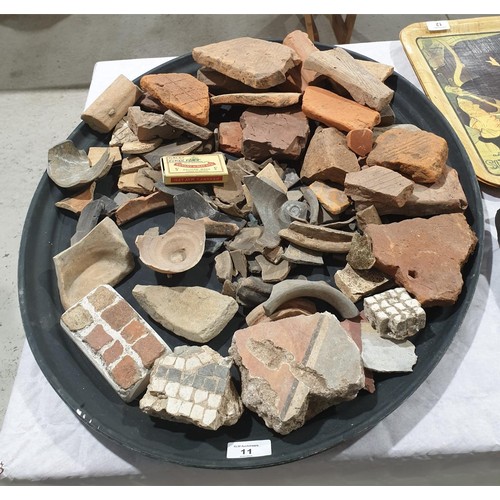 11 - A selection of ancient potsherds, terracotta and tesserae. UK shipping £14.