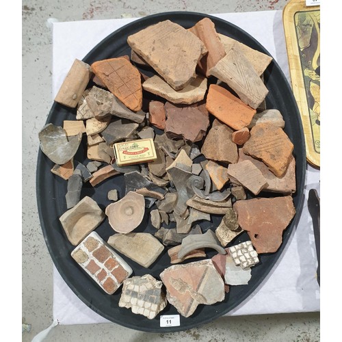 11 - A selection of ancient potsherds, terracotta and tesserae. UK shipping £14.