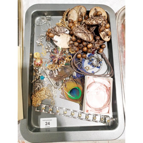 24 - A tray of costume jewellery and a hallmarked silver bracelet. UK shipping £14.