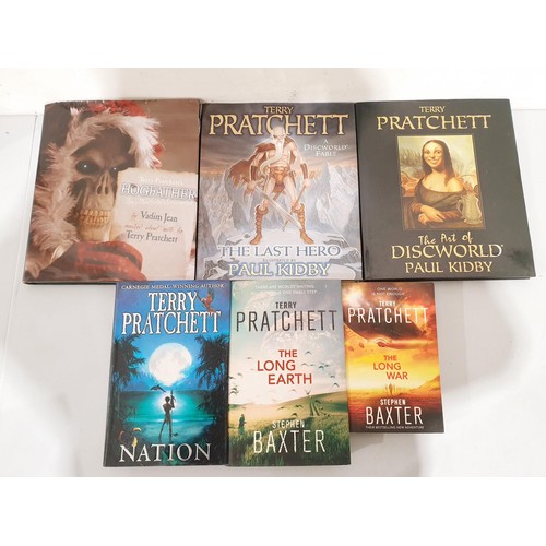 30 - A selection of Terry Pratchett Discworld and other books including Equal Rites hardback, VHS cassett... 