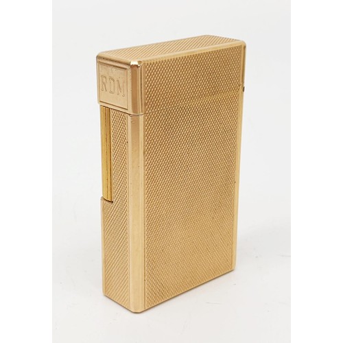 289 - A boxed S. T. Dupont gold plated lighter with paperwork. UK shipping £14.