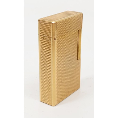 289 - A boxed S. T. Dupont gold plated lighter with paperwork. UK shipping £14.