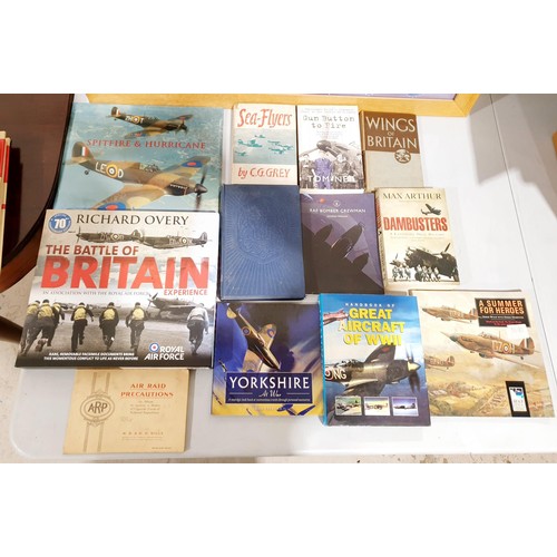 38 - A selection of books and DVDs relating to World War II era tanks and aircraft. UK shipping £14.